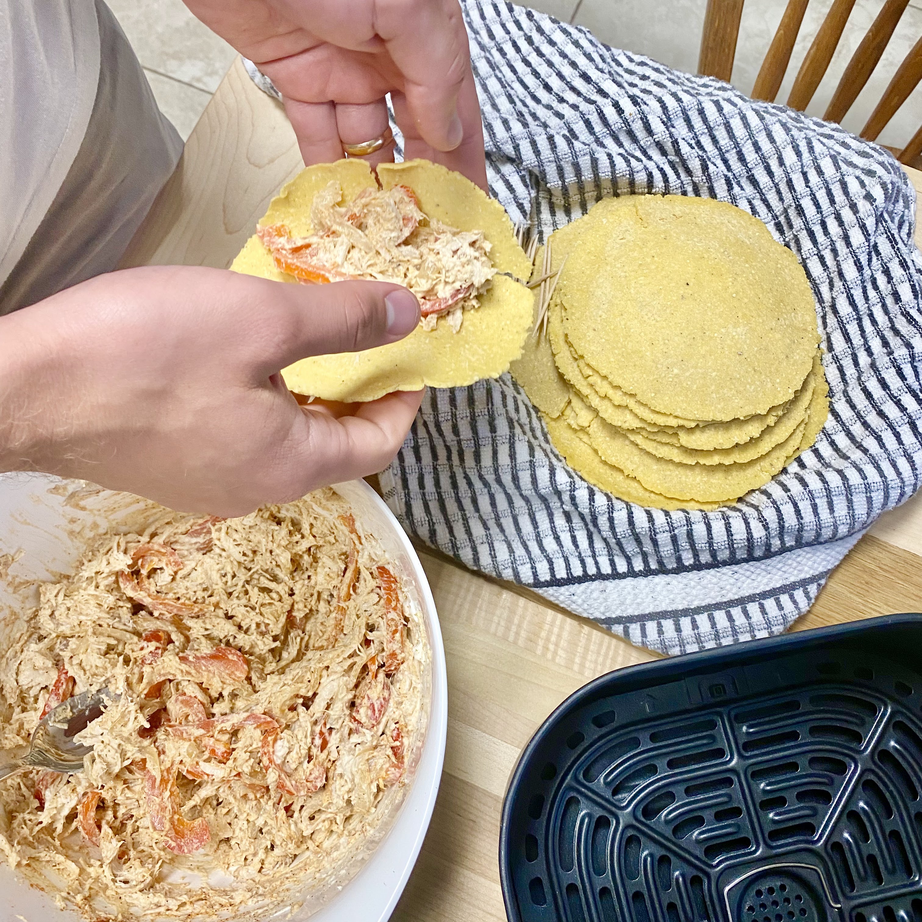 homemade taquitos with guacamole on top