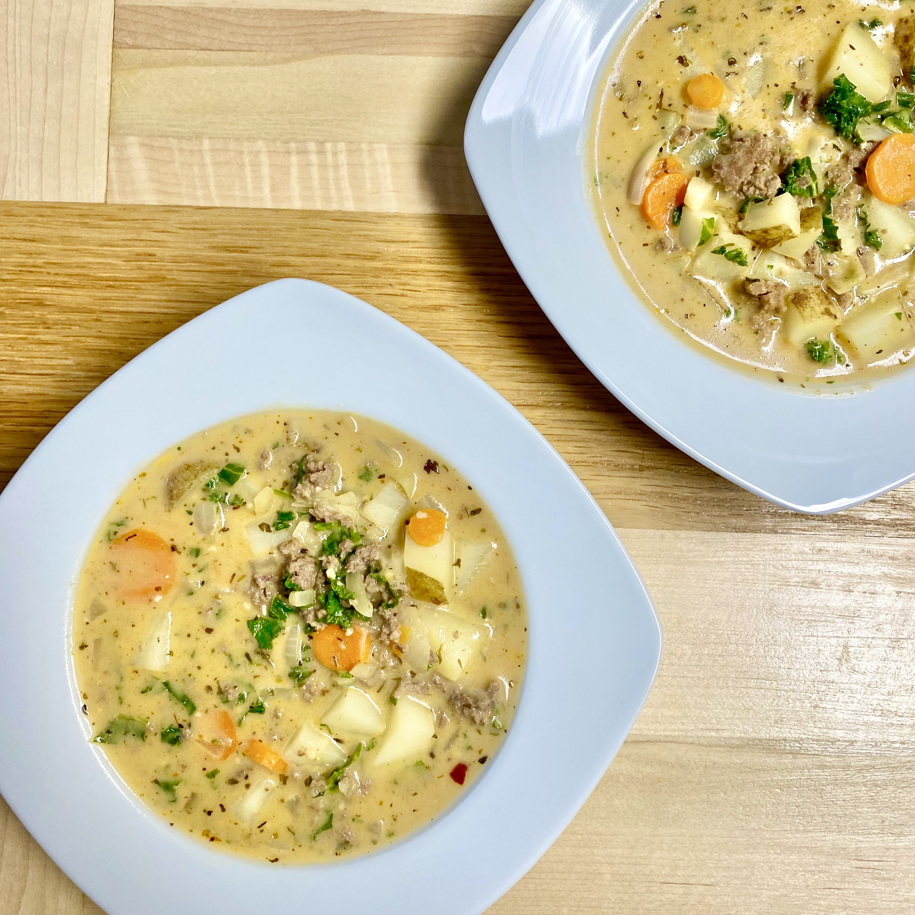 two bowls of zuppa Toscana