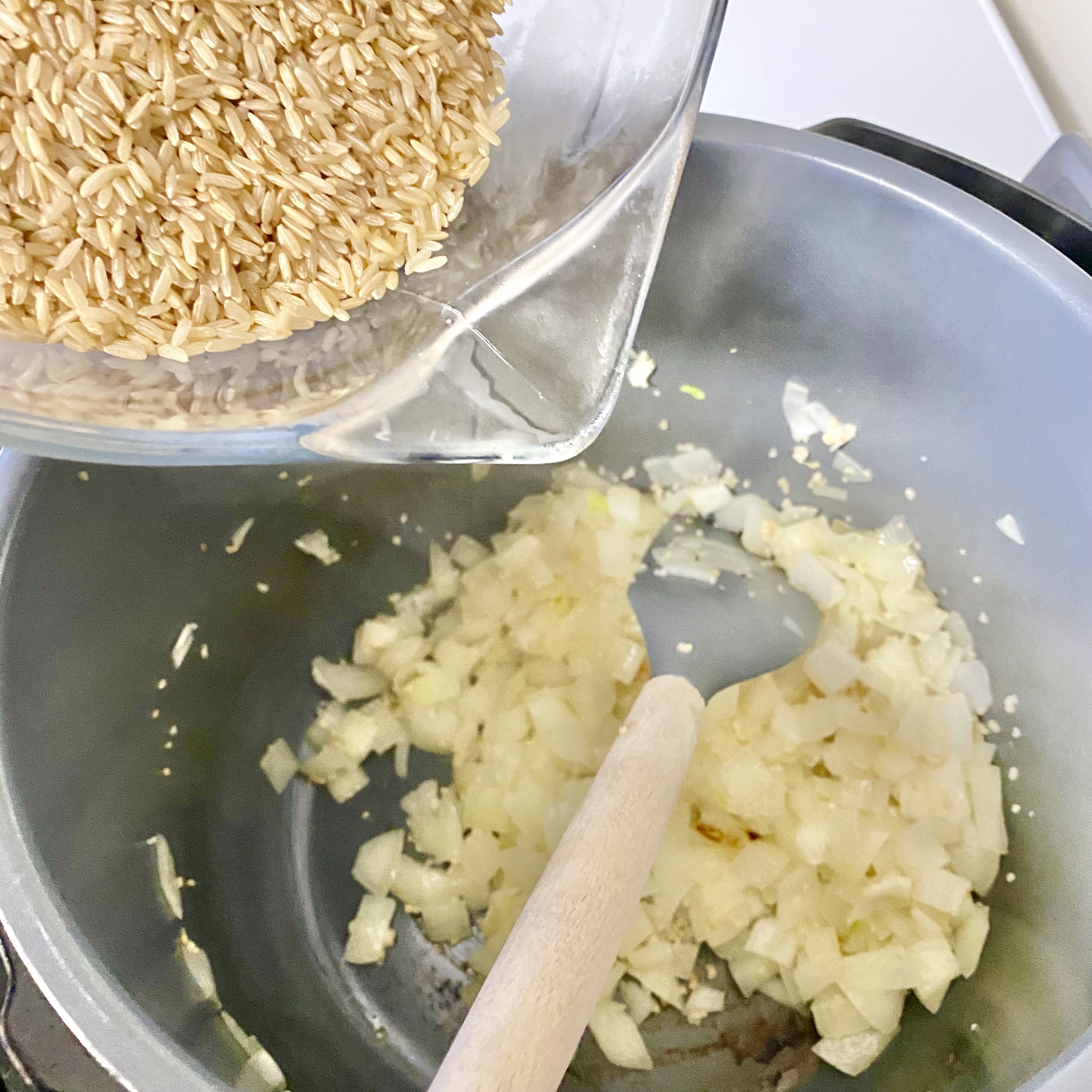 brown rice in a bowl with a fork