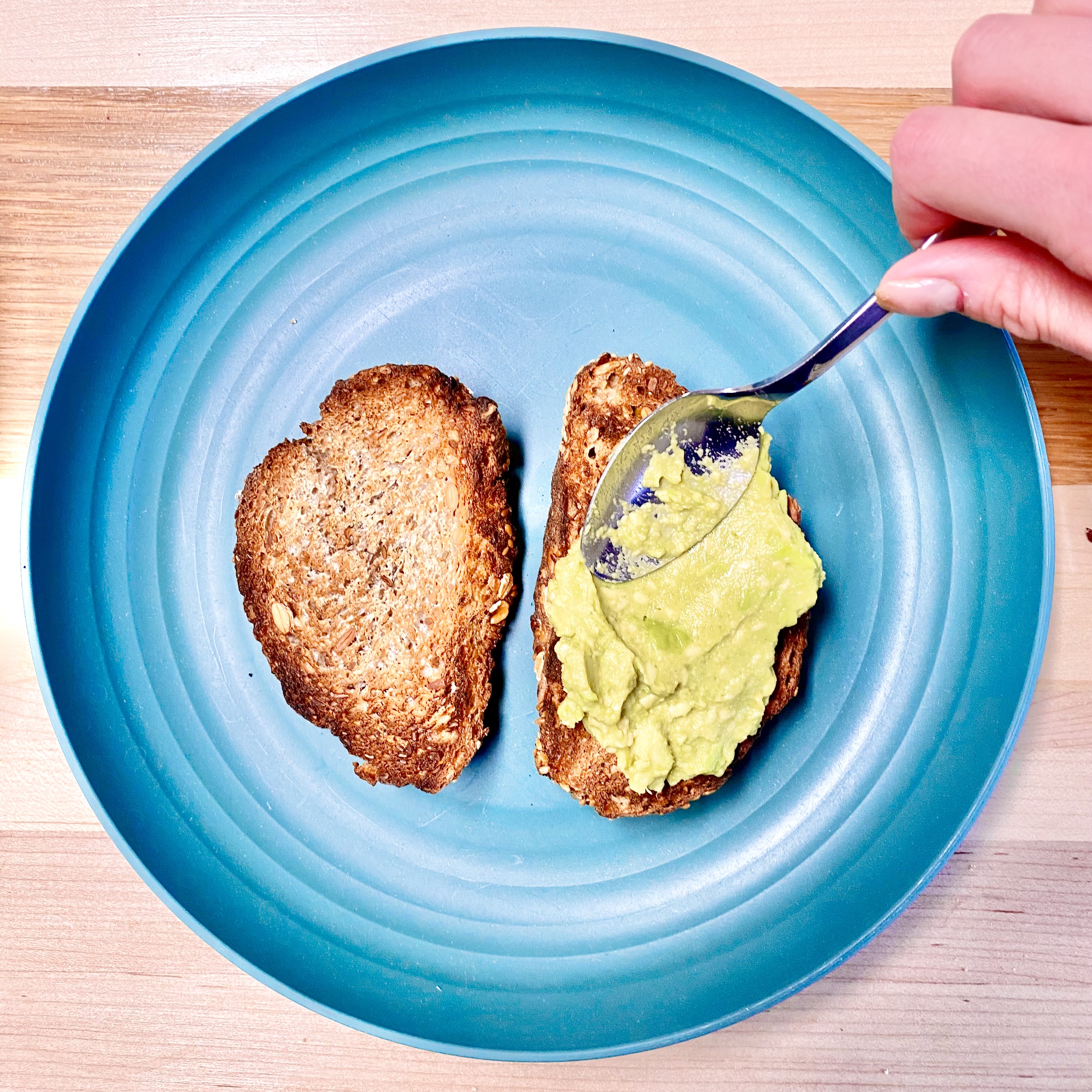 2 pieces of toast on a blue plate