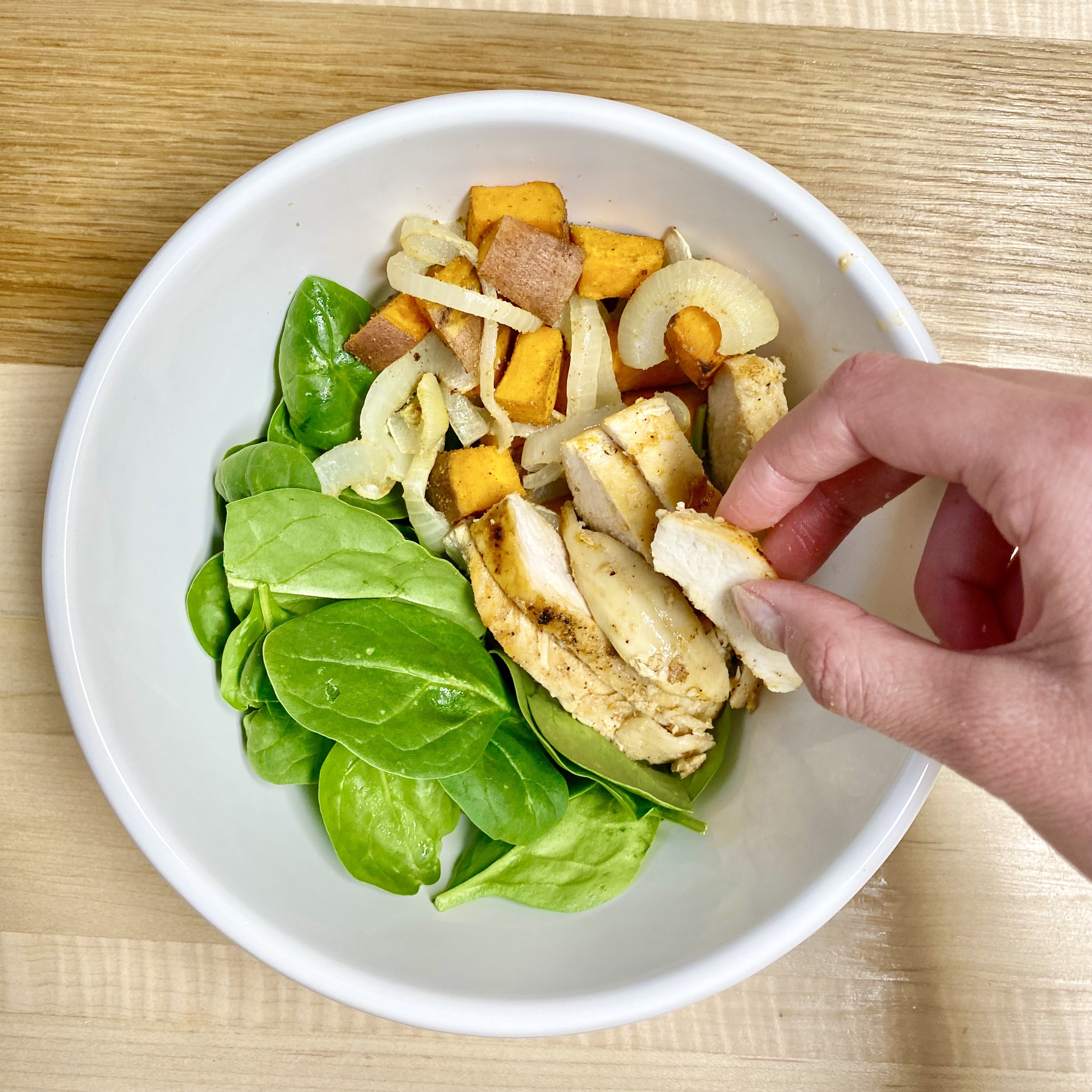 sweet potato, chicken, and hummus salad bowl