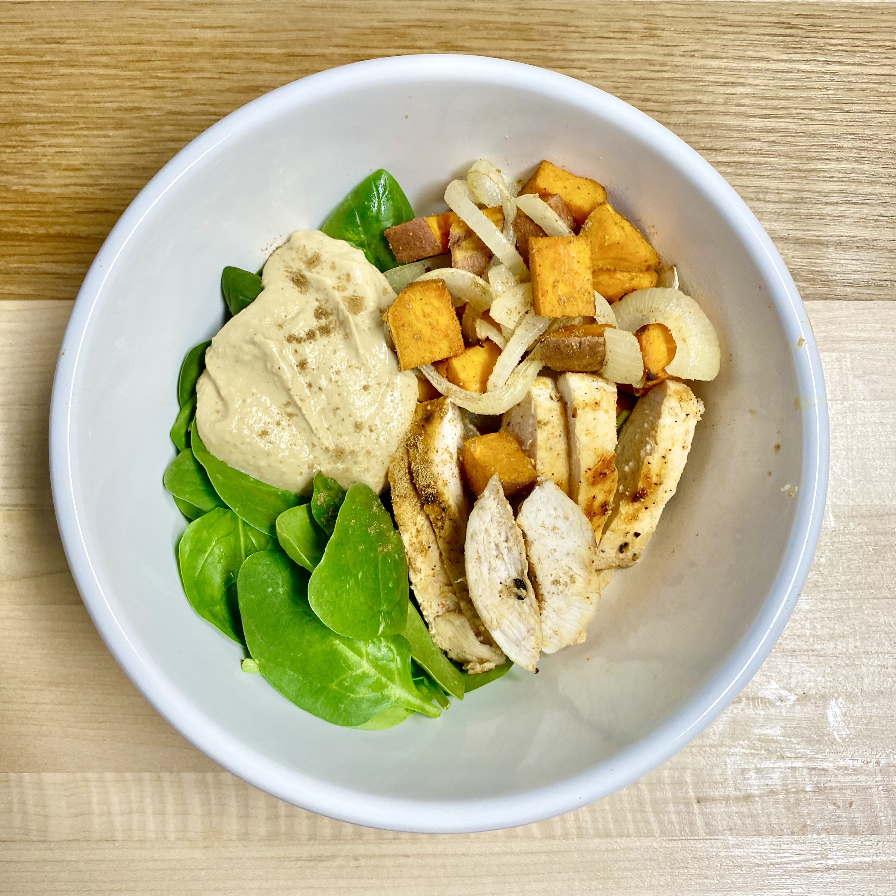 sweet potato, chicken, and hummus salad bowl