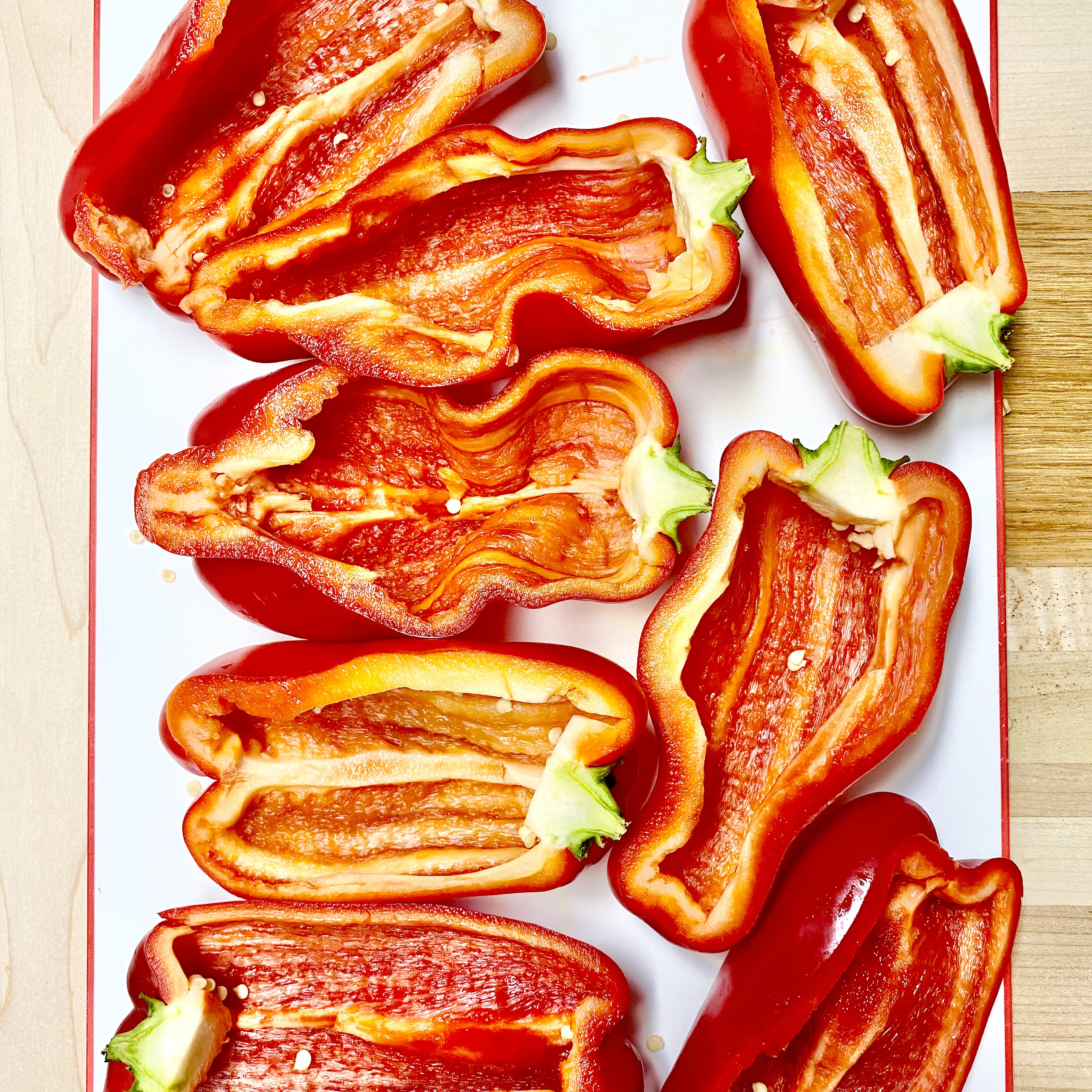 Two stuffed bell peppers with guacamole